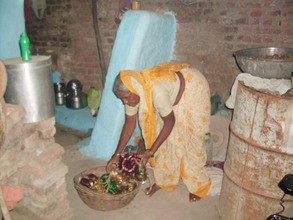 Babytai assembling her wares before she leaves