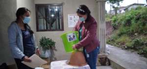 Staff assembling clay filters for the community