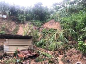 houses damaged by mud slides