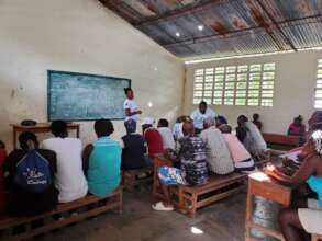 Training people about water contamination.