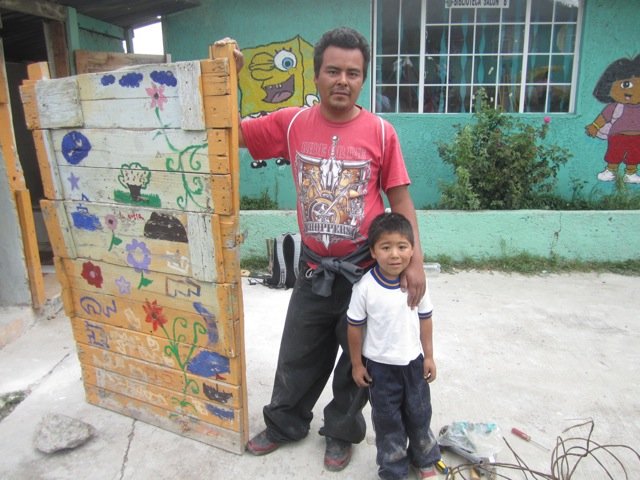 rebuilding the school latrine