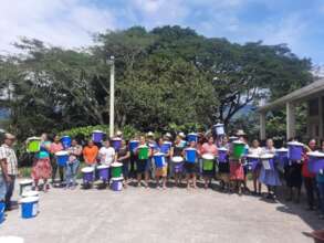 Honduran families receiving safe water filters
