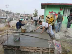 Pouring the floors of the latrines