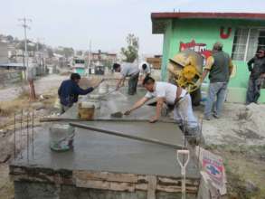 Pouring the floors of the latrines
