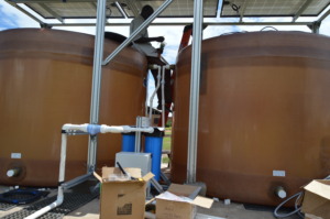 Engineers Installing Water Filtration System.