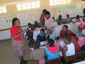 Linda, DfGZimbabwe director teaching Luveve school