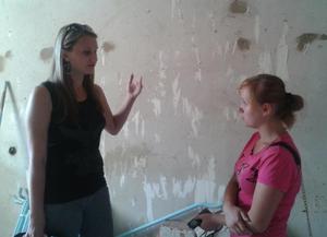 Discussing renovation plan with social worker