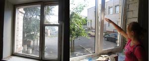 Nina is opening new window in her flat