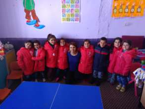 Teacher Esra with her students