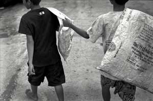 Child Ait-Chai (trash) collectors