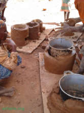 Making improved cookstoves in the community