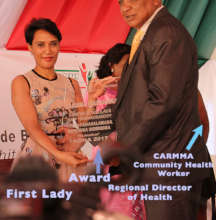 First Lady presenting the CARMMA Award