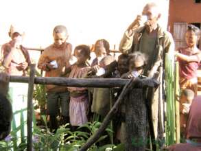 Dadaleva drinking from the communal faucet