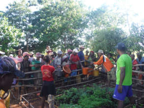 Villagers at Bary's tree nursery getting seedlings