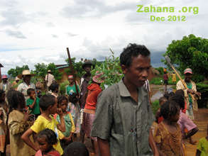 Led by our teacher the community plants trees