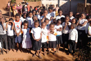 Students waiting in the villag for 'it' to start