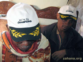 Raleva our traditional healer and his son.