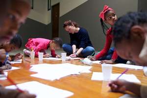 Melanie, founder of Streetlight Schools with kids