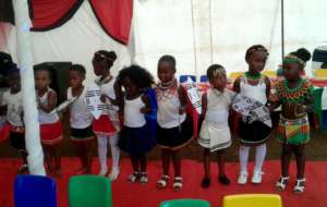 Children Performing at Graduation Celebration