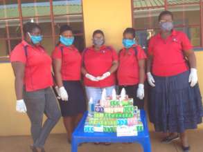 Staff ready to distribute soap to the community