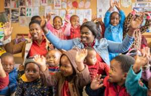 Teachers and kids reciting a rhyme