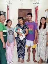 Mercy midwives adoring a new baby