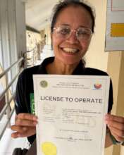 Head Midwife Marlene with our certificate!