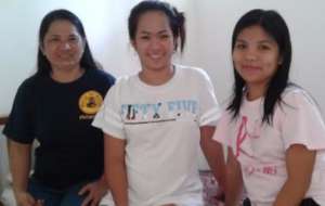 The Midwives with a patient on Mindoro island