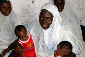 Traditional midwife and her twins