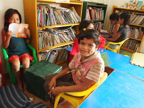 Children reading at the community library
