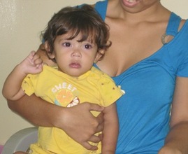 Little girl with mother, successful surgery