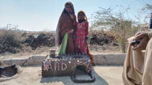 Rural women making stove