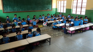 School Kids with their new school T-shirts.