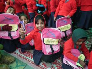 Our student after getting her gift on new year.