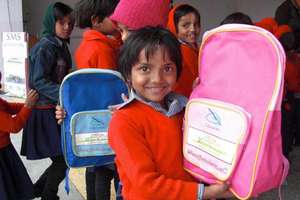 A little girl after receiving her gift
