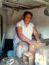 Woman at eco-friendly stove in El Nance, Honduras