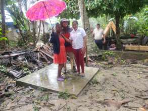 Community leader Mirtha (left), Warren (center)