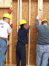 Alecia works with vols on her Pleasant Grove home