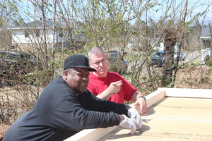 Mr. Cooper worked alongside volunteers on his home