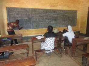 Mwalimu Dibeit teaching at Study Camp