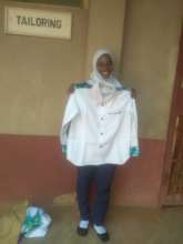 Rabia shows off a shirt she made