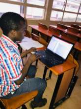 Saidi working on his thesis