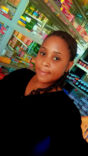 Mary at her new job at a pharmacy in Kahama