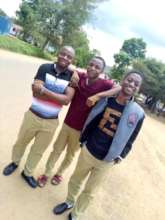Sospeter (left) and Anzaruni (center) at College