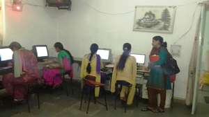 CAF auditor interacting with students