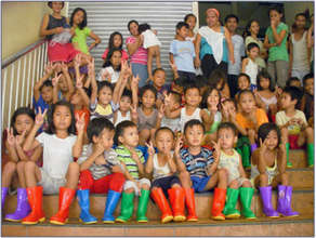 Children with their new rain boots