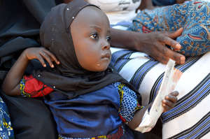 Little girl in Burkina Faso receives Plumpy'Nut