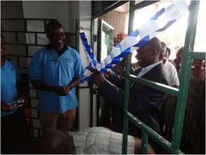 CFW--ribbon cutting at grand opening--Ugunja