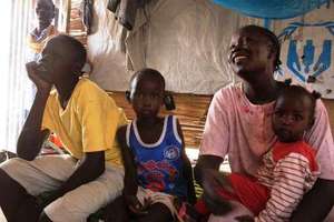 Helen Akompeo (right) and fellow Sudanese refugees