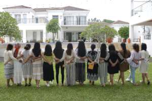 Residents linking arms at Shine final celebration